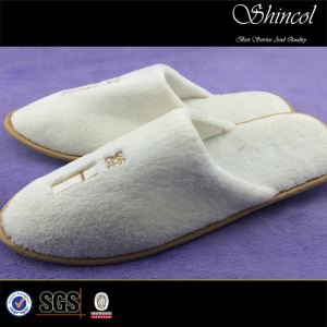 white velour slippers for hotel use