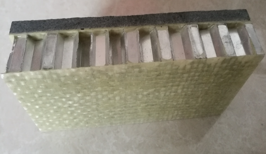 stone backed with fiberglass honeycomb panels.png