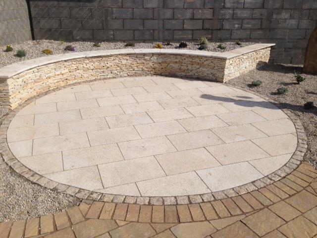 Brown granite paving together with granite cobble to make a circle landscaping patio. you can choose cobble of different color to get a different effect.jpg