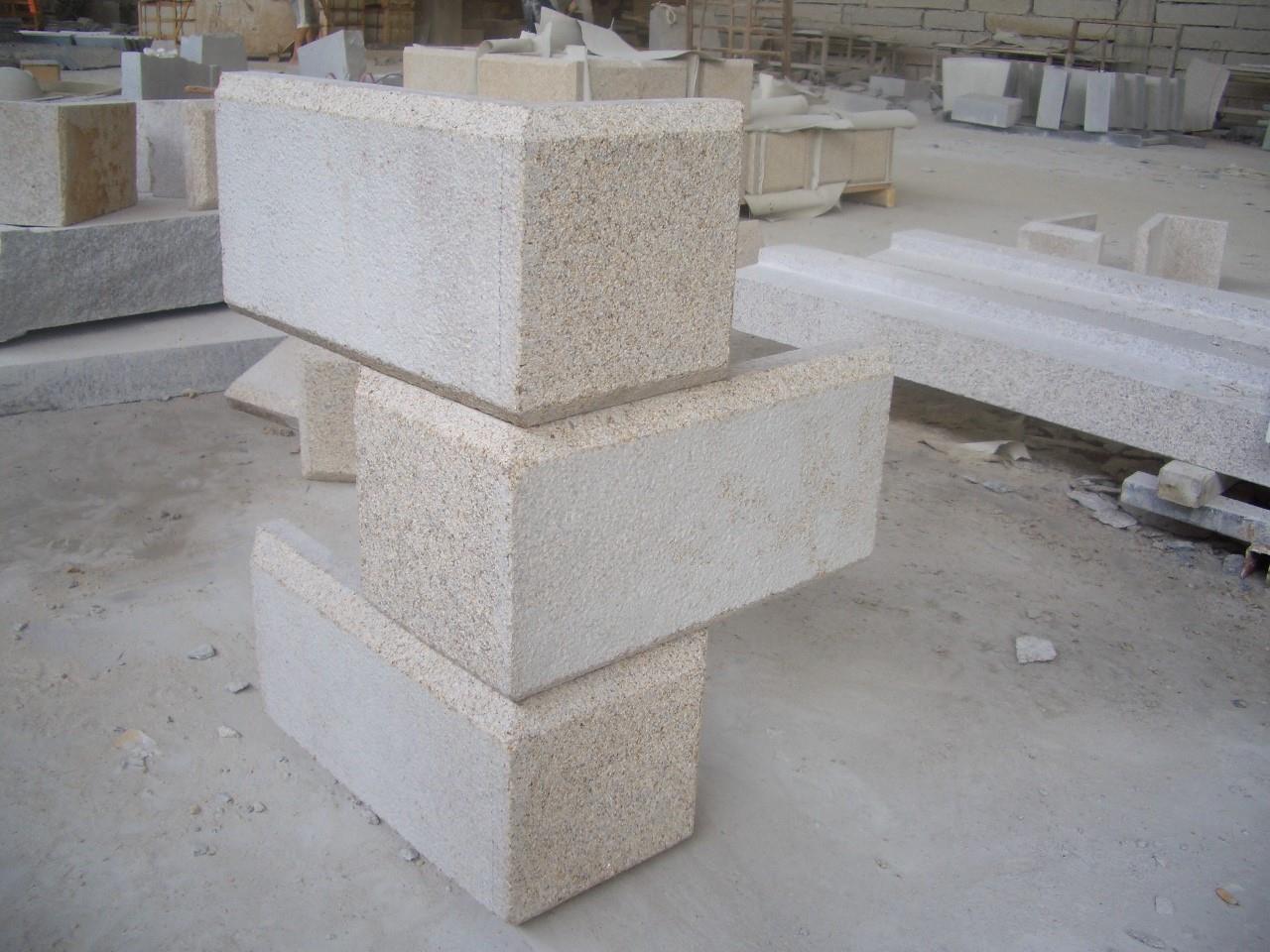 quoin stone by stick on style with smooth bush hammer finishing.JPG