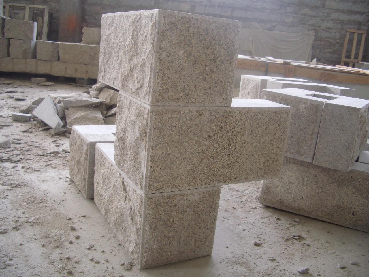 solid quoin stone by rock face finishing.JPG
